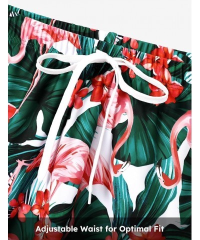 Family Matching Swimsuits Ruffle-Sleeve Two-Piece Tropical Plant Printed Bathing Suit and Swim Trunks Men Flamingo Green $16....